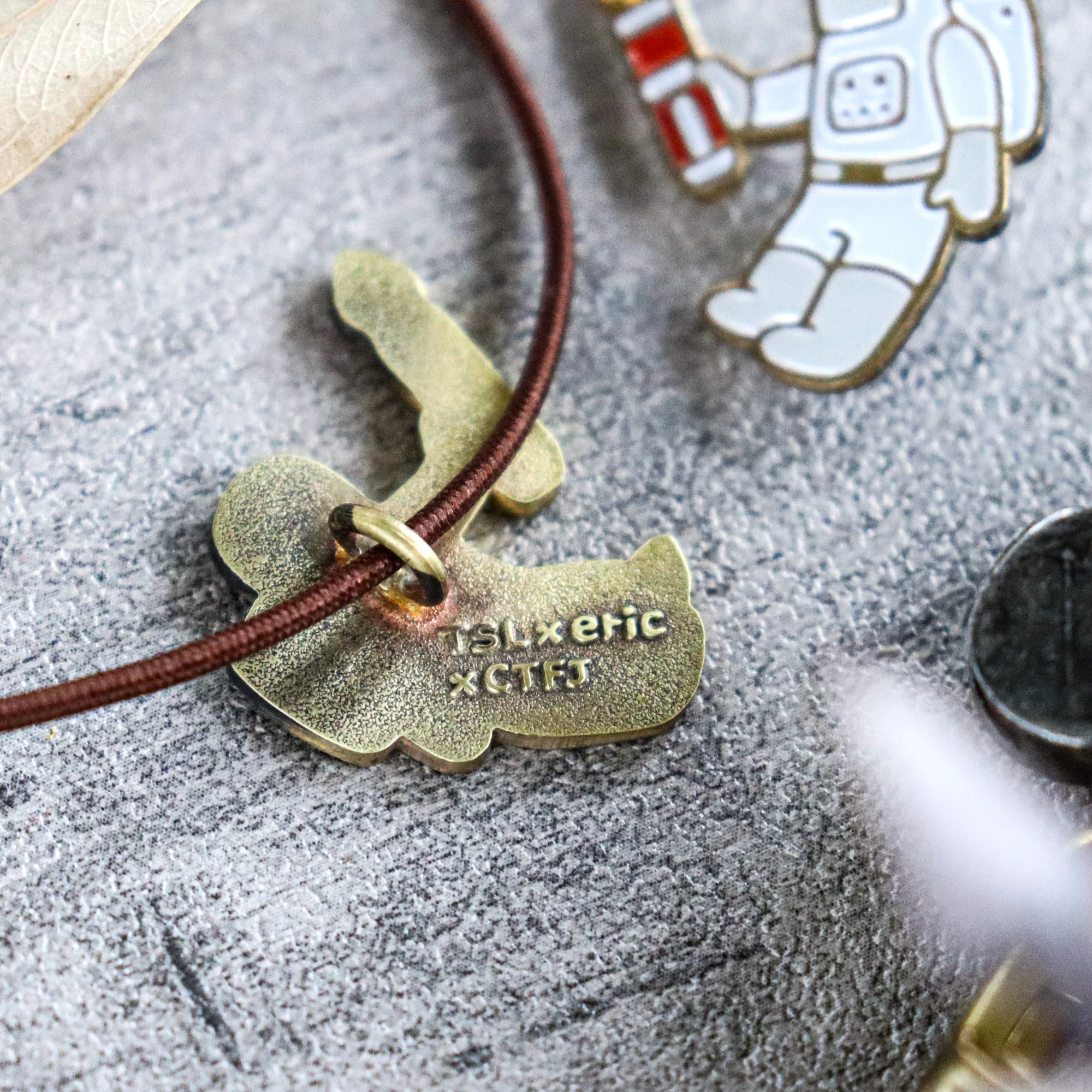Limited Edition TSL x eric X CTFJ / Brass Concho Charm - Astronaut with Fountain Pen - Image 5